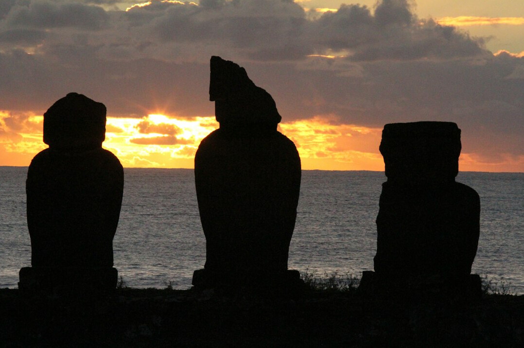 Moai statues on Rapa Nui Easter Island at sunrise