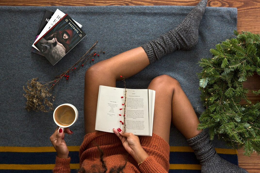 woman reading mystery novel